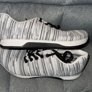 NOBULL Black and White Athletic Shoes with Striped Design